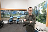 Artist Niles paints new mural for city library