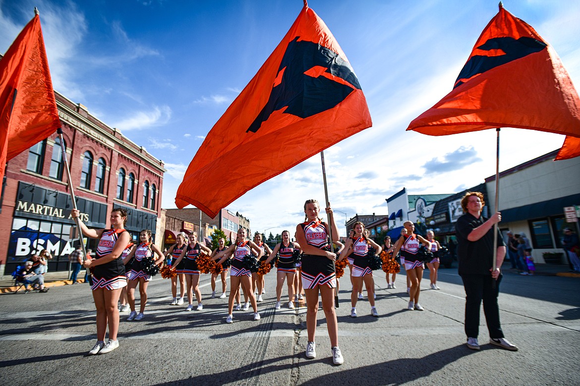 Flathead High School cheerleaders march in the school's Homecoming Parade on Main Street on Wednesday, Sept. 18. (Casey Kreider/Daily Inter Lake)