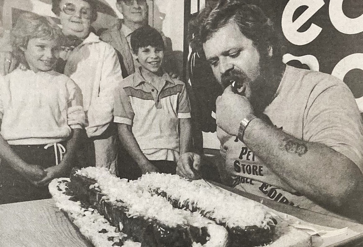 In September 1984, Bob Kiser of Coeur d’Alene is shown with his mountainous hot dog feast at the Incredible Edible Dog.