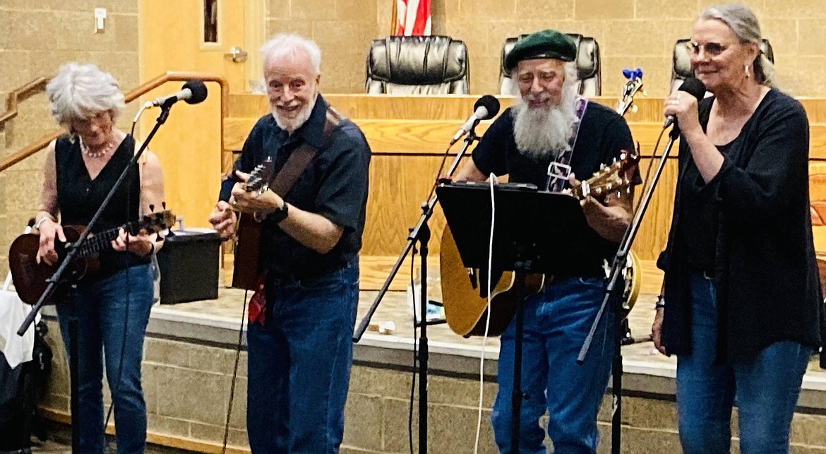 In summer 2024, Christian writer Frank Peretti and his wife, Barbara, the couple on the left, performed with T & Company at the Coeur d’Alene Library.