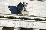 Federal Reserve cuts key rate by sizable half-point, signaling end to its inflation fight