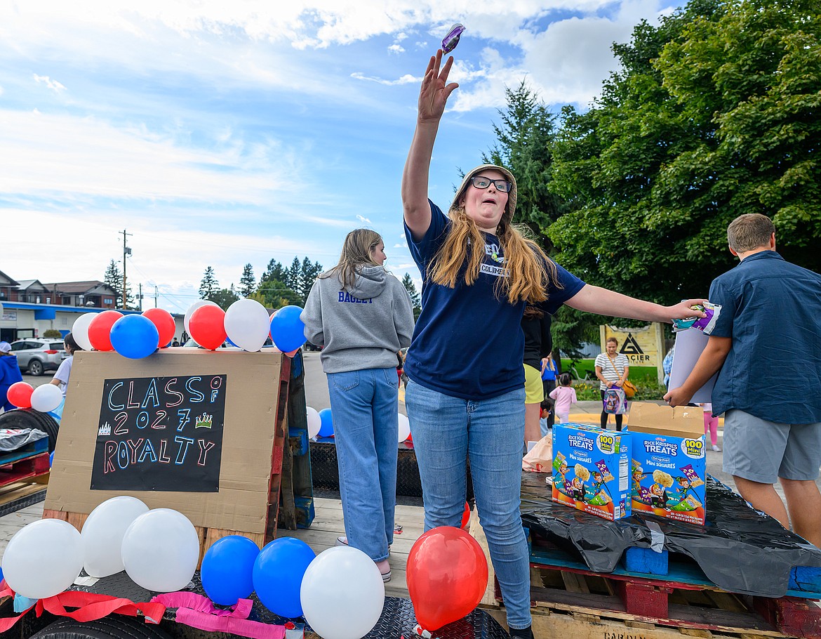 Eleanor Smiley throws candy to the crowd.