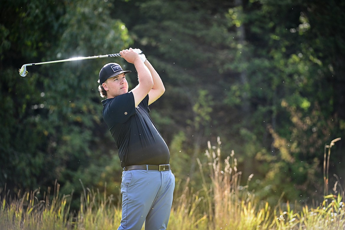 Flathead's Dylan Morris watches his tee shot on the fifth hole during the Kalispell Invitational at Buffalo Hill Golf Club on Thursday, Sept. 19. (Casey Kreider/Daily Inter Lake)