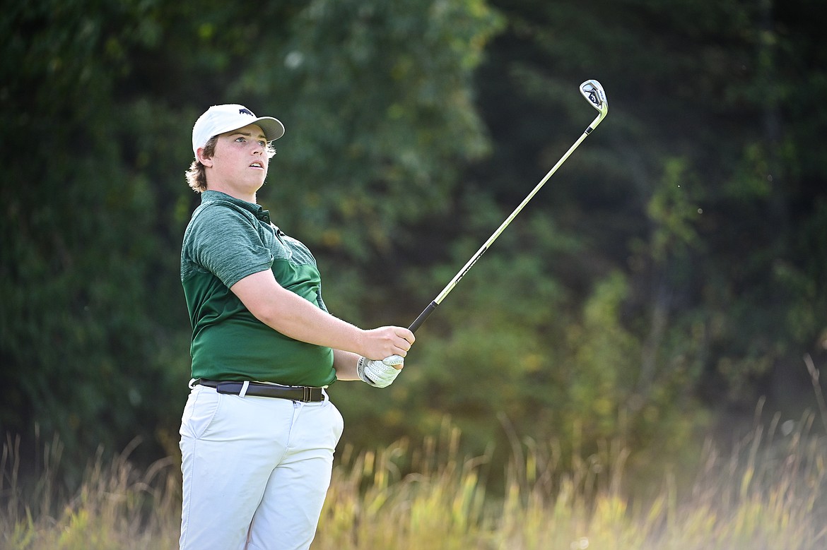 Glacier's Tanyon Murray watches his tee shot on the fifth hole during the Kalispell Invitational at Buffalo Hill Golf Club on Thursday, Sept. 19. (Casey Kreider/Daily Inter Lake)