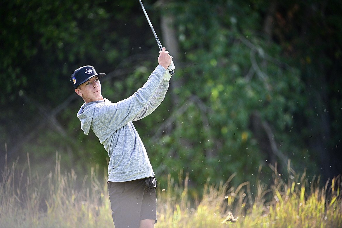 Polson's Max Milton watches his tee shot on the fifth hole during the Kalispell Invitational at Buffalo Hill Golf Club on Thursday, Sept. 19. (Casey Kreider/Daily Inter Lake)