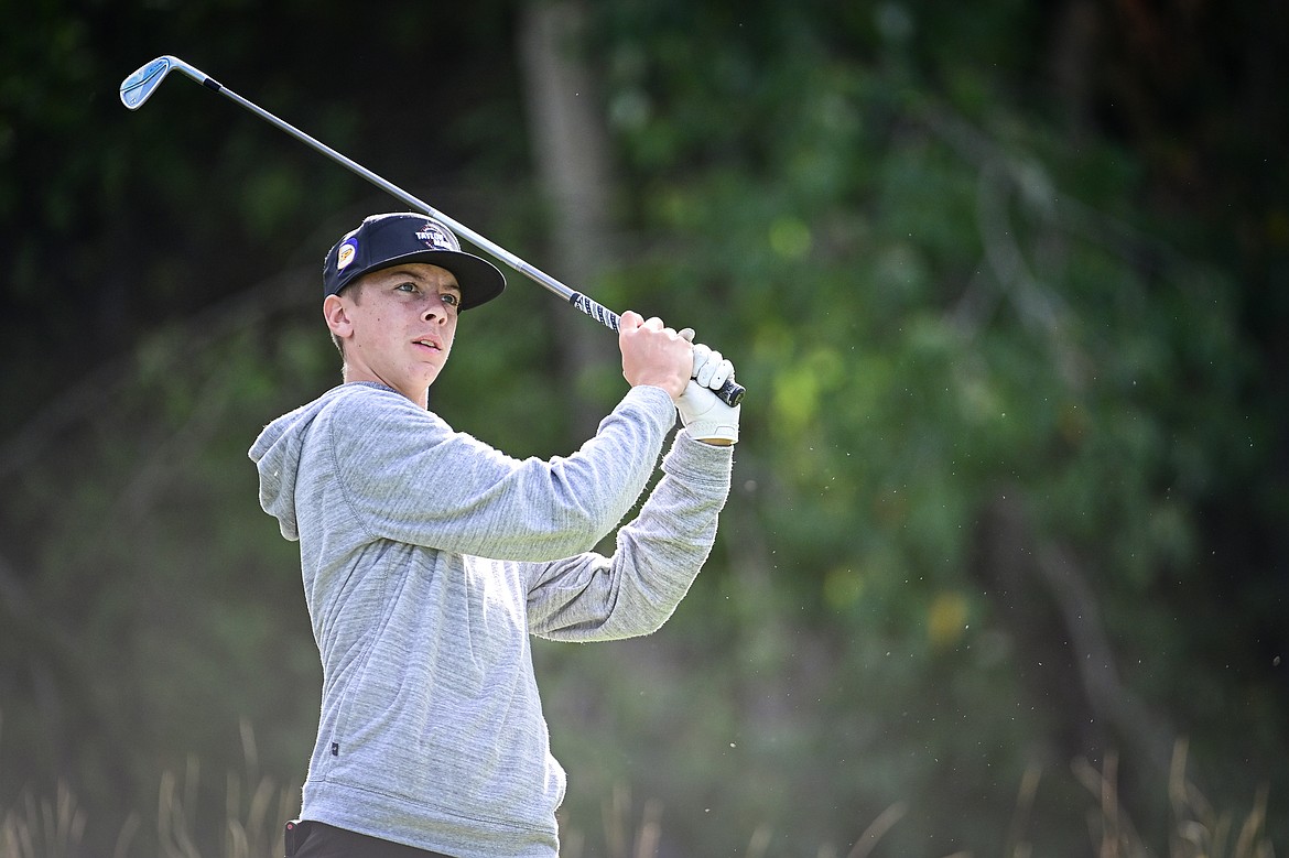 Polson's Max Milton watches his tee shot on the fifth hole during the Kalispell Invitational at Buffalo Hill Golf Club on Thursday, Sept. 19. (Casey Kreider/Daily Inter Lake)