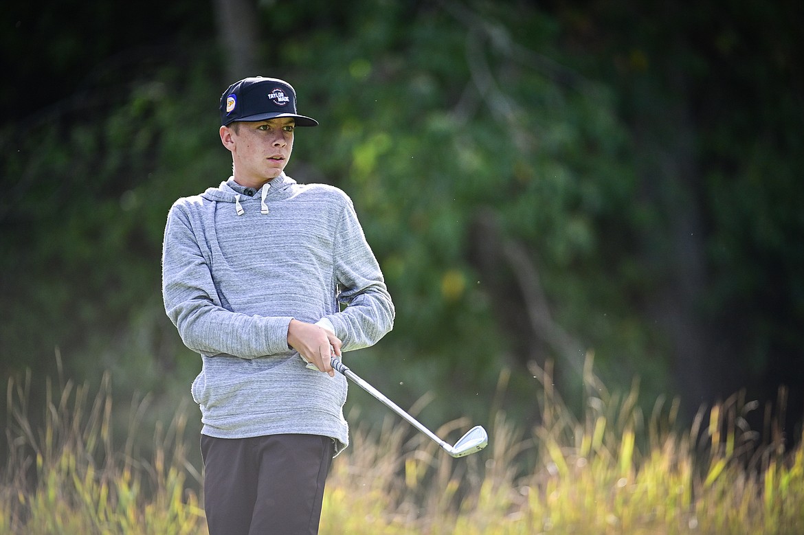 Polson's Max Milton watches his tee shot on the fifth hole during the Kalispell Invitational at Buffalo Hill Golf Club on Thursday, Sept. 19. (Casey Kreider/Daily Inter Lake)