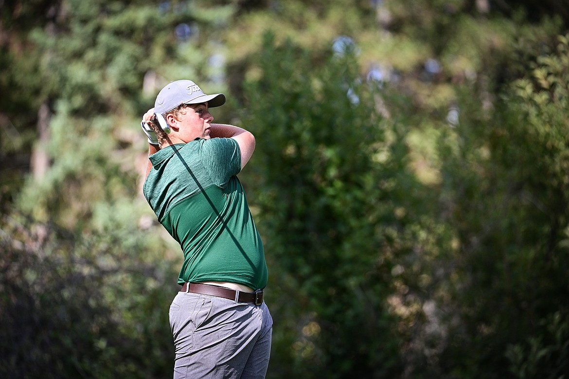 Glacier's Luke Nelson watches his tee shot on the sixth hole during the Kalispell Invitational at Buffalo Hill Golf Club on Thursday, Sept. 19. (Casey Kreider/Daily Inter Lake)