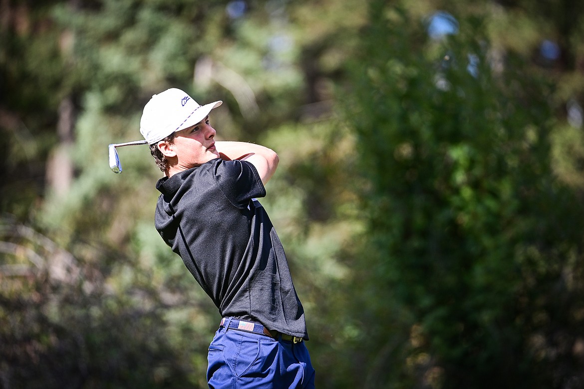 Columbia Falls' Winslow Peters watches his tee shot on the sixth hole during the Kalispell Invitational at Buffalo Hill Golf Club on Thursday, Sept. 19. (Casey Kreider/Daily Inter Lake)