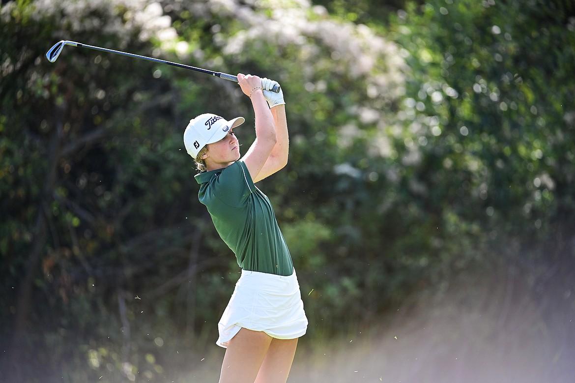 Whitefish's Stella Jaffe watches her tee shot on the fifth hole during the Kalispell Invitational at Buffalo Hill Golf Club on Thursday, Sept. 19. (Casey Kreider/Daily Inter Lake)