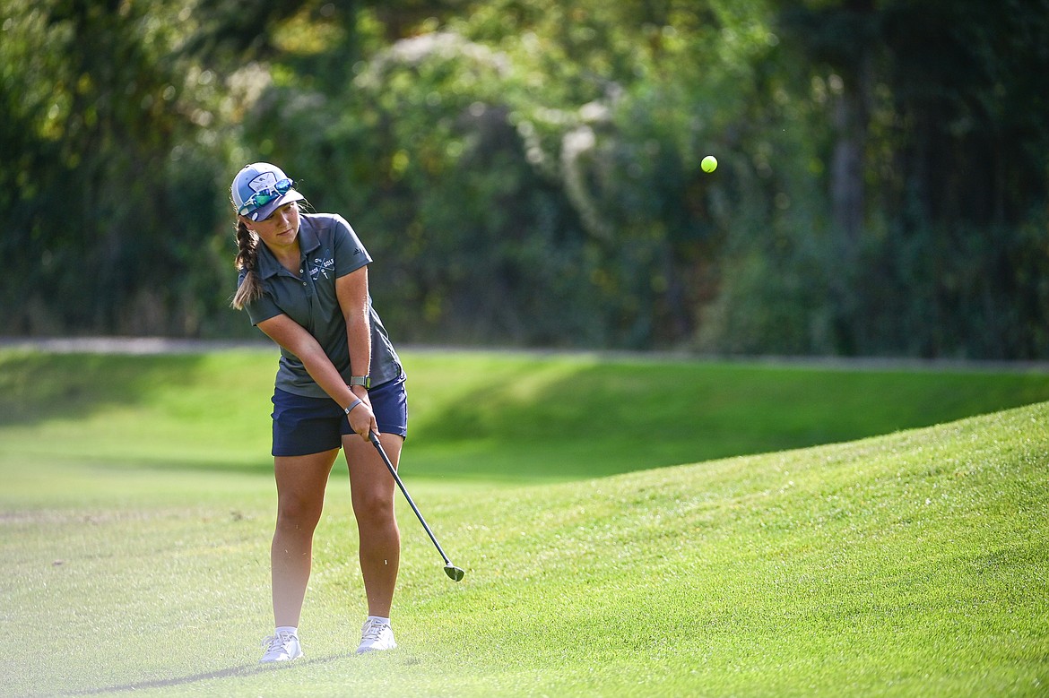 Great Falls' Hanna Boyd chips onto the fifth green during the Kalispell Invitational at Buffalo Hill Golf Club on Thursday, Sept. 19. (Casey Kreider/Daily Inter Lake)