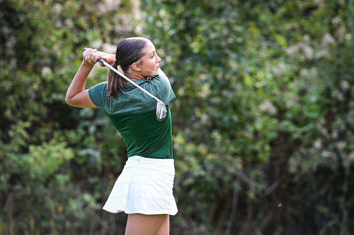 Glacier's Kendall Tkachyk watches her shot on the fifth hole during the Kalispell Invitational at Buffalo Hill Golf Club on Thursday, Sept. 19. (Casey Kreider/Daily Inter Lake)