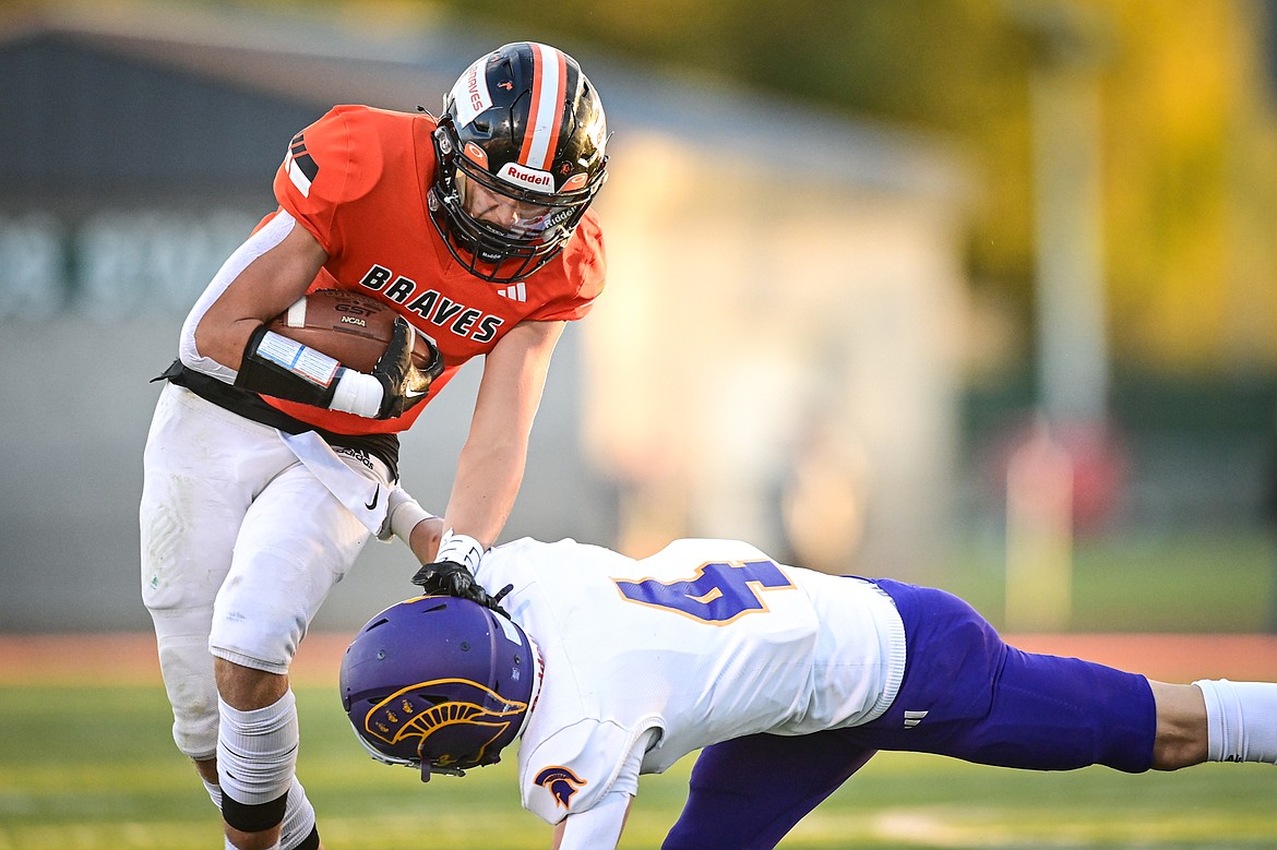 Flathead wide receiver Eli Coopman (6) picks up yardage after a reception in the first quarter against Missoula Sentinel at Legends Stadium on Friday, Sept. 20. (Casey Kreider/Daily Inter Lake)