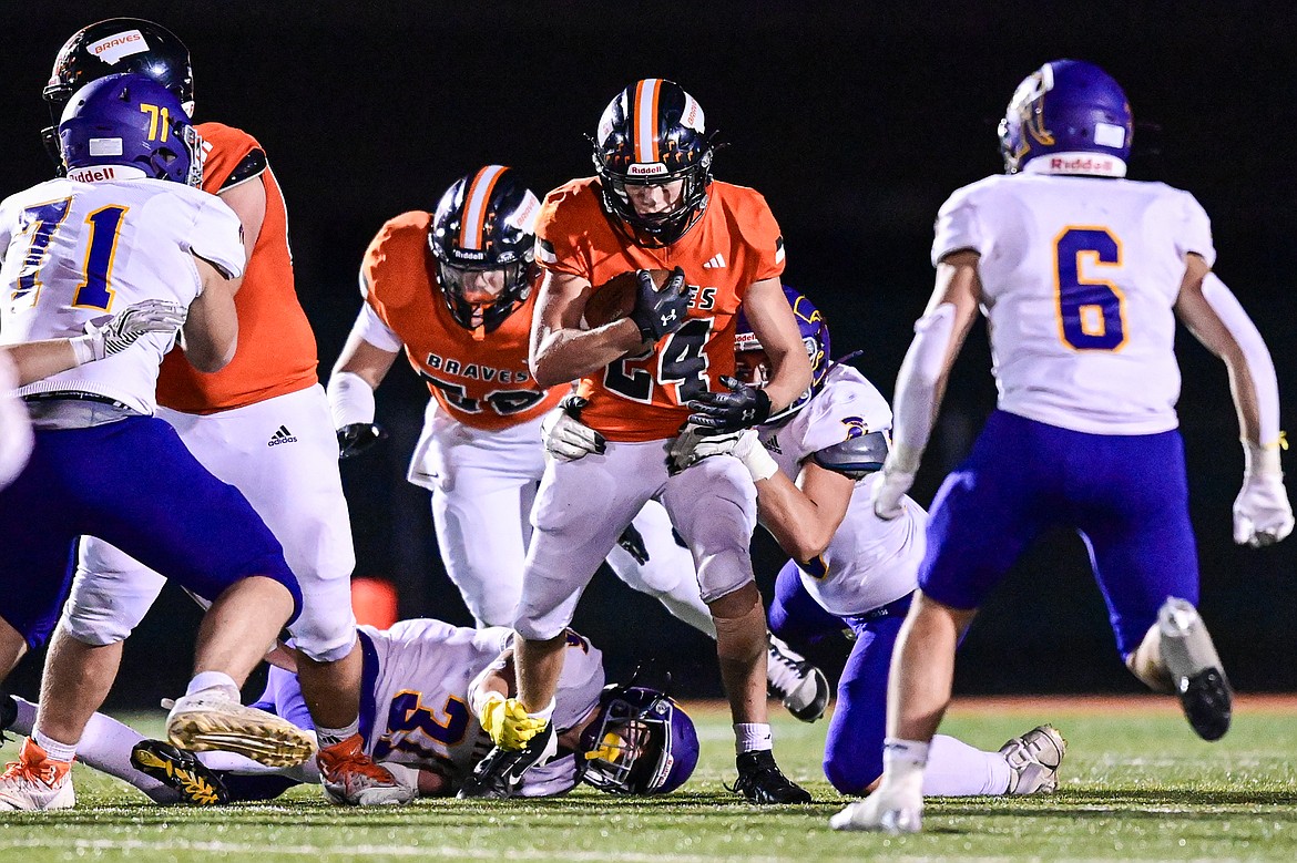 Flathead running back Nolan Campbell (24) looks for room to run in the fourth quarter against Missoula Sentinel at Legends Stadium on Friday, Sept. 20. (Casey Kreider/Daily Inter Lake)