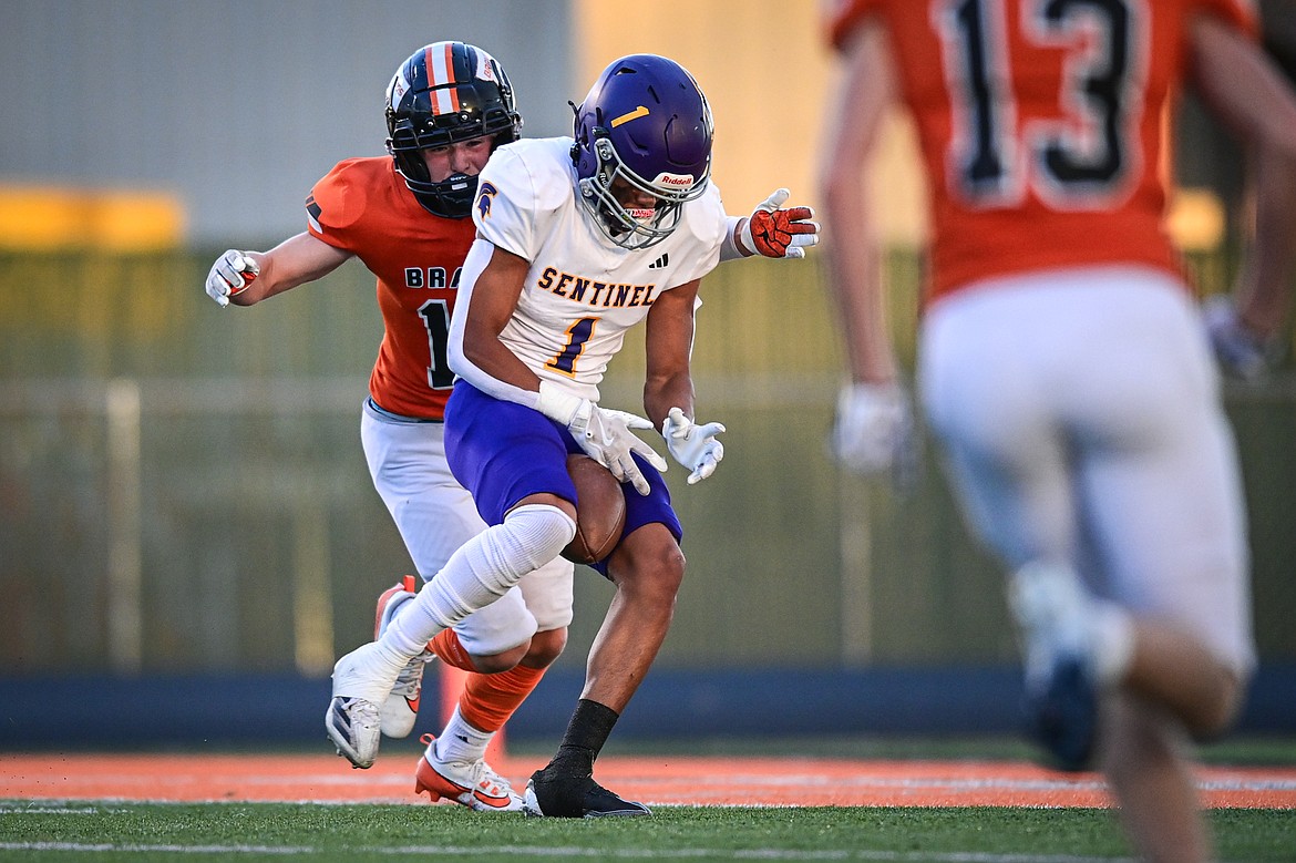 Missoula Sentinel wide receiver C.J. Hayhurst (1) holds on to a touchdown reception in the first bquarter against Flathead at Legends Stadium on Friday, Sept. 20. (Casey Kreider/Daily Inter Lake)