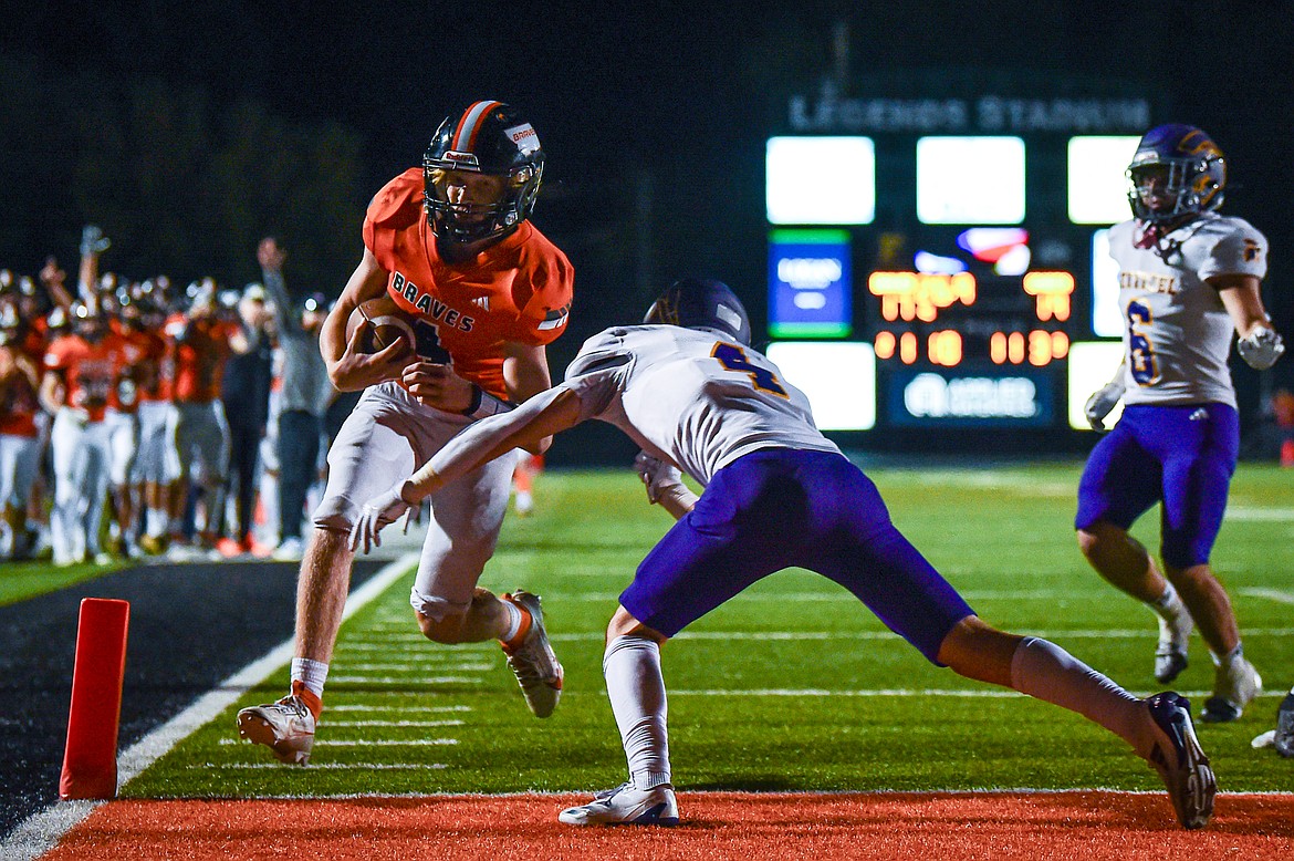 Flathead quarterback Brett Pesola (4) runs for a touchdown in the third quarter against Missoula Sentinel at Legends Stadium on Friday, Sept. 20. (Casey Kreider/Daily Inter Lake)