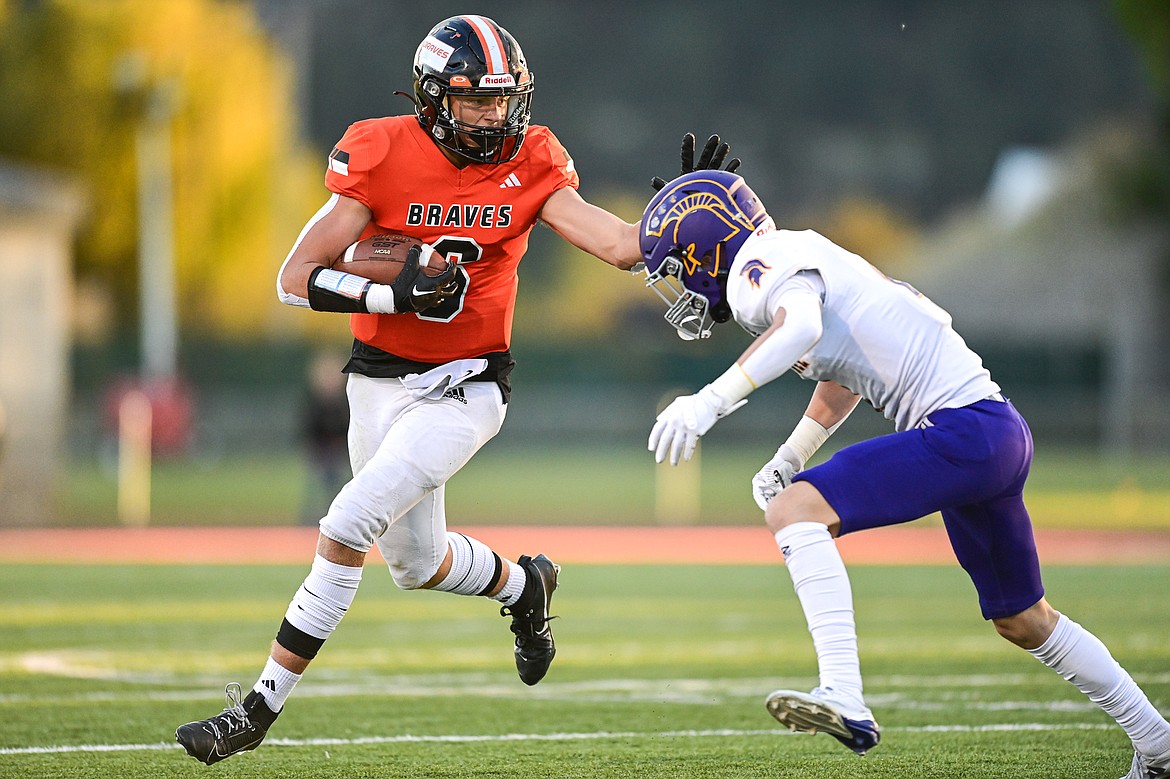 Flathead wide receiver Eli Coopman (6) picks up yardage after a reception in the first quarter against Missoula Sentinel at Legends Stadium on Friday, Sept. 20. (Casey Kreider/Daily Inter Lake)