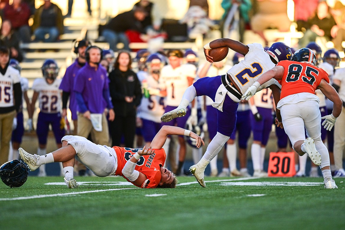 Flathead defensive lineman Kohen Rilley (69) loses his helmet sacking Missoula Sentinel quarterback Jace Koshatka (2) in the first quarter at Legends Stadium on Friday, Sept. 20. (Casey Kreider/Daily Inter Lake)