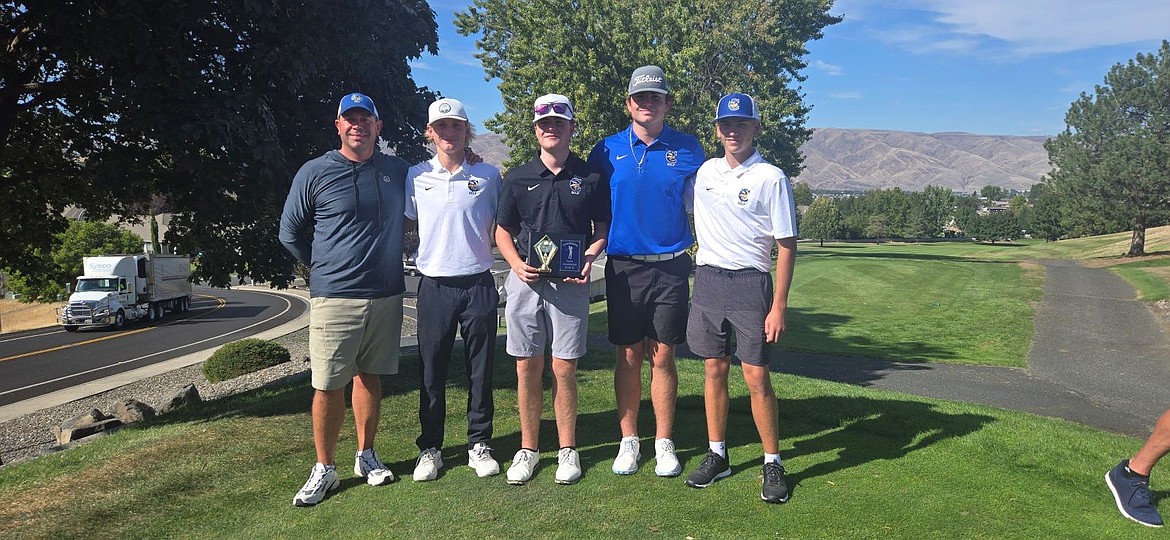 Courtesy photo
The Coeur d'Alene boys golf team claimed the team title at the Lewiston Invitational at Bryden Canyon Golf Course. From left are coach Chase Bennett, Brady Rubert, Ben Focke, Dylan Cook and Hunter Paquin. Not pictured is Grant Potter.