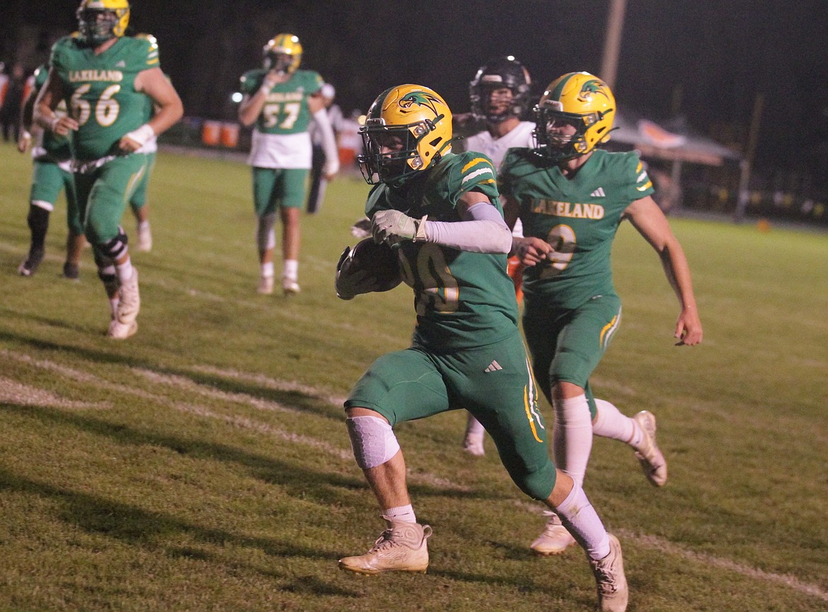 JASON ELLIOTT/Press
Lakeland junior Cash Lund scored on a 16-yard run before halftime of Friday's game with Post Falls at Corbit Field in Rathdrum.