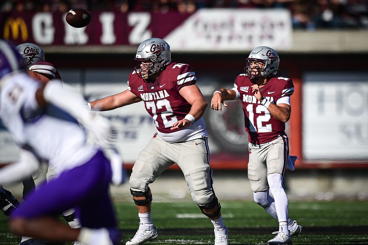 Grizzlies quarterback Logan Fife (12) throws in the fourth quarter against Western Carolina at Washington-Grizzly Stadium on Saturday, Sept. 21. (Casey Kreider/Daily Inter Lake)