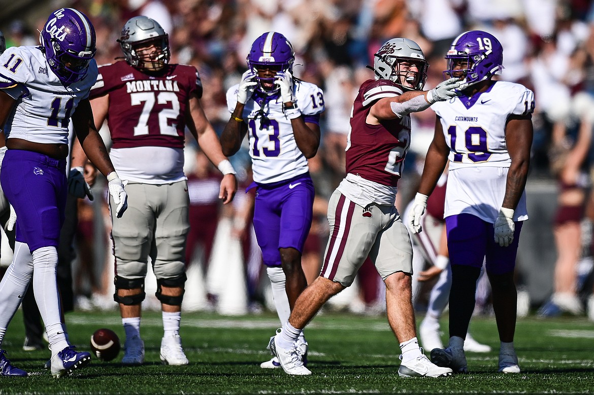 Grizzlies running back Nick Ostmo (26) motions for a first down after a run in the fourth quarter against Western Carolina at Washington-Grizzly Stadium on Saturday, Sept. 21. (Casey Kreider/Daily Inter Lake)