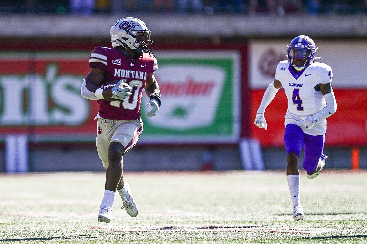 Grizzlies running back Eli Gillman (10) breaks a 58-yard run in the third quarter against Western Carolina at Washington-Grizzly Stadium on Saturday, Sept. 21. (Casey Kreider/Daily Inter Lake)