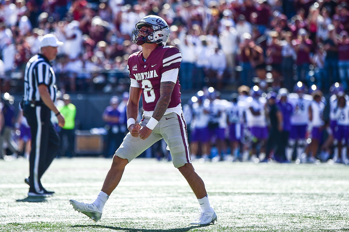 Grizzlies quarterback Keali'i Ah Yat (8) celebrates after a 12-yard run in the third quarter against Western Carolina at Washington-Grizzly Stadium on Saturday, Sept. 21. (Casey Kreider/Daily Inter Lake)