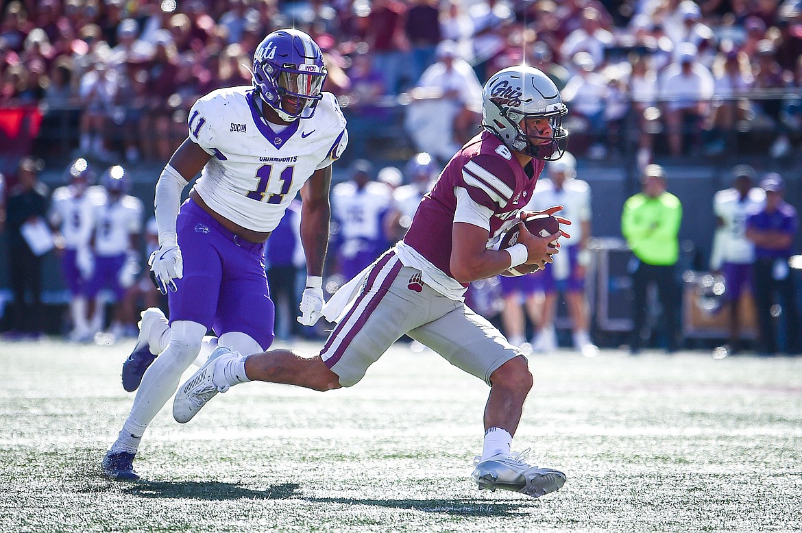 Grizzlies quarterback Keali'i Ah Yat (8) sets up a third-quarter touchdown with a 12-yard run to the 1-yard line against Western Carolina at Washington-Grizzly Stadium on Saturday, Sept. 21. (Casey Kreider/Daily Inter Lake)