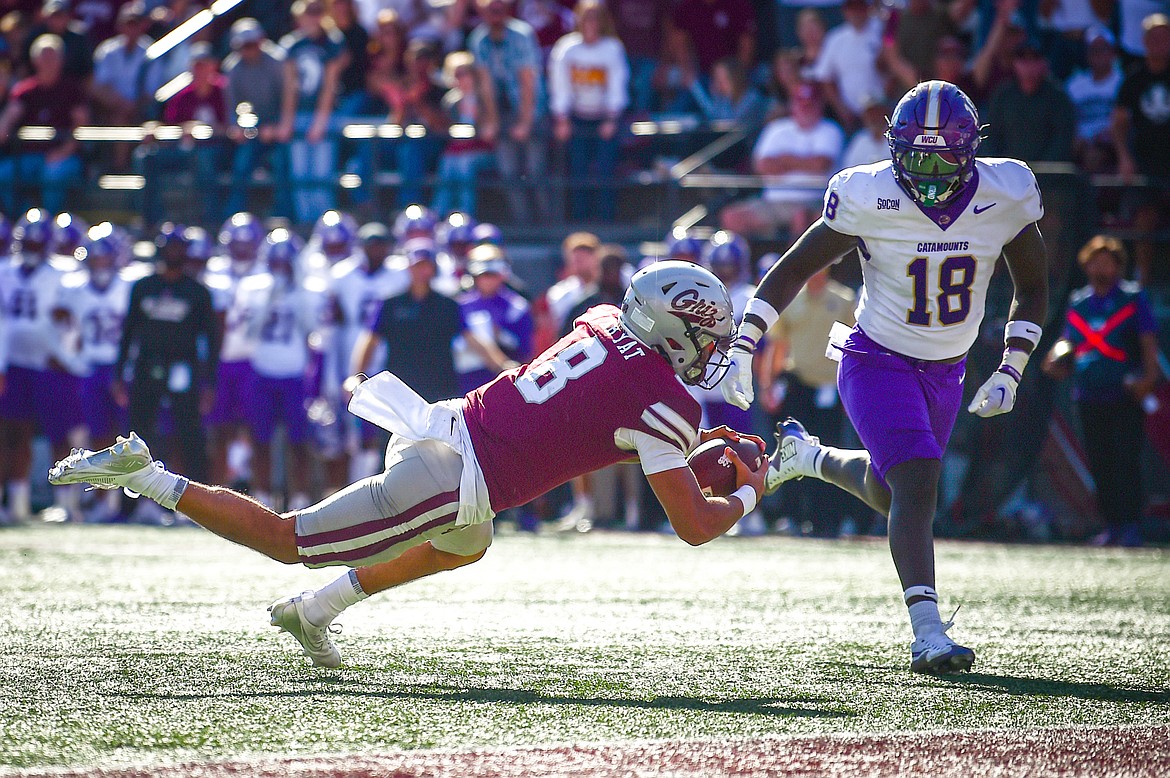 Grizzlies quarterback Keali'i Ah Yat (8) sets up a third-quarter touchdown with a 12-yard run to the 1-yard line against Western Carolina at Washington-Grizzly Stadium on Saturday, Sept. 21. (Casey Kreider/Daily Inter Lake)