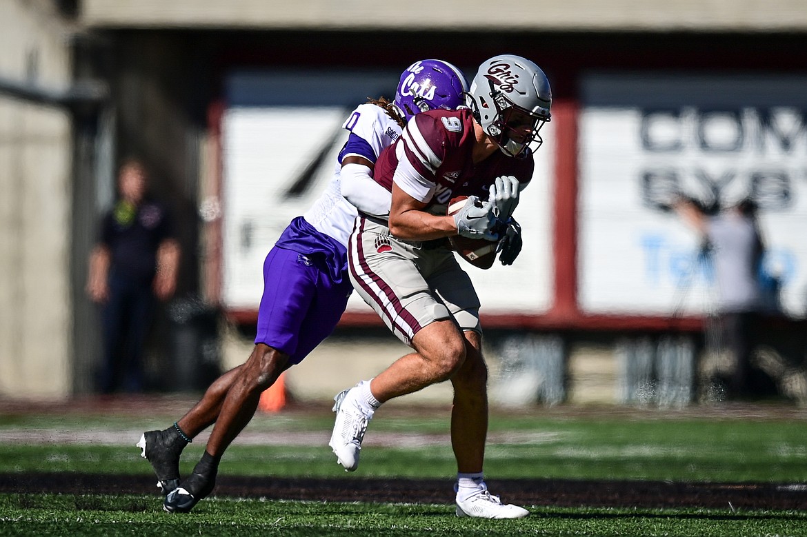 Grizzlies wide receiver Sawyer Racanelli (9) holds on to a reception in the second quarter against Western Carolina at Washington-Grizzly Stadium on Saturday, Sept. 21. (Casey Kreider/Daily Inter Lake)