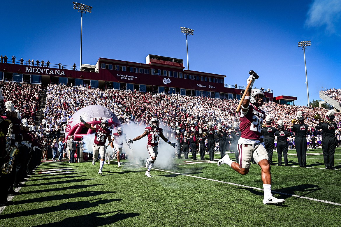 The Montana Grizzlies take the field before their matchup with Western Carolina at Washington-Grizzly Stadium on Saturday, Sept. 21. (Casey Kreider/Daily Inter Lake)