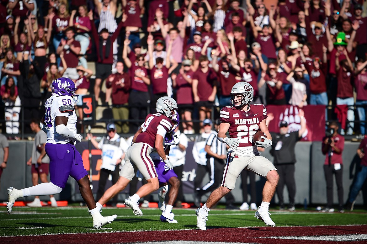 Grizzlies running back Nick Ostmo (26) scores a touchdown on a 12-yard run in the fourth quarter against Western Carolina at Washington-Grizzly Stadium on Saturday, Sept. 21. (Casey Kreider/Daily Inter Lake)