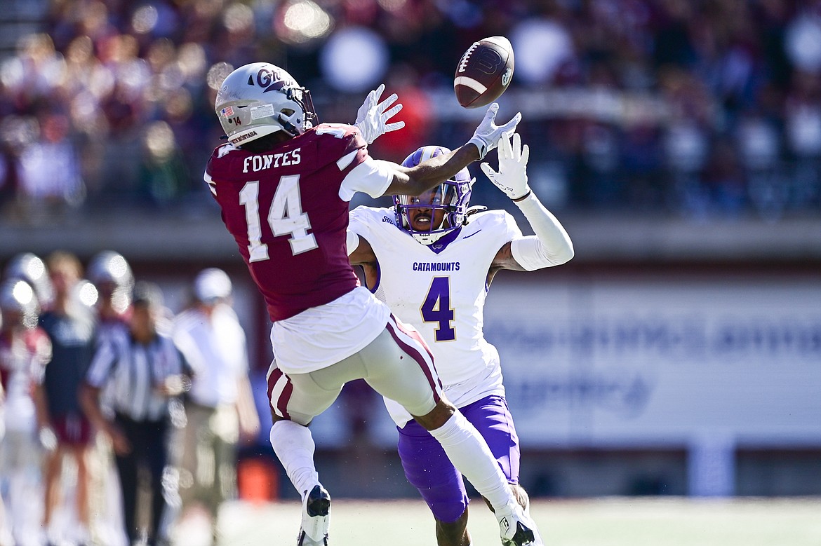 Western Carolina defensive back CJ Williams (4) defends a pass attempt to Grizzlies wide receiver Aaron Fontes (14) in the third quarter at Washington-Grizzly Stadium on Saturday, Sept. 21. (Casey Kreider/Daily Inter Lake)