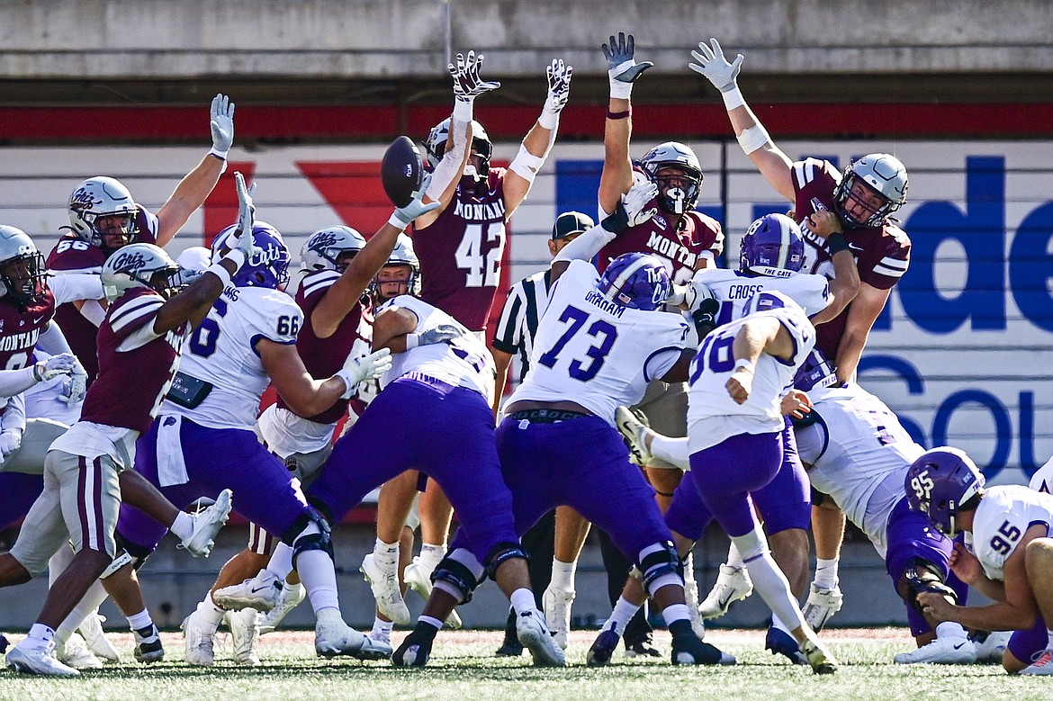 Grizzlies special teamers try to block a field goal in the third quarter by Western Carolina at Washington-Grizzly Stadium on Saturday, Sept. 21. (Casey Kreider/Daily Inter Lake)