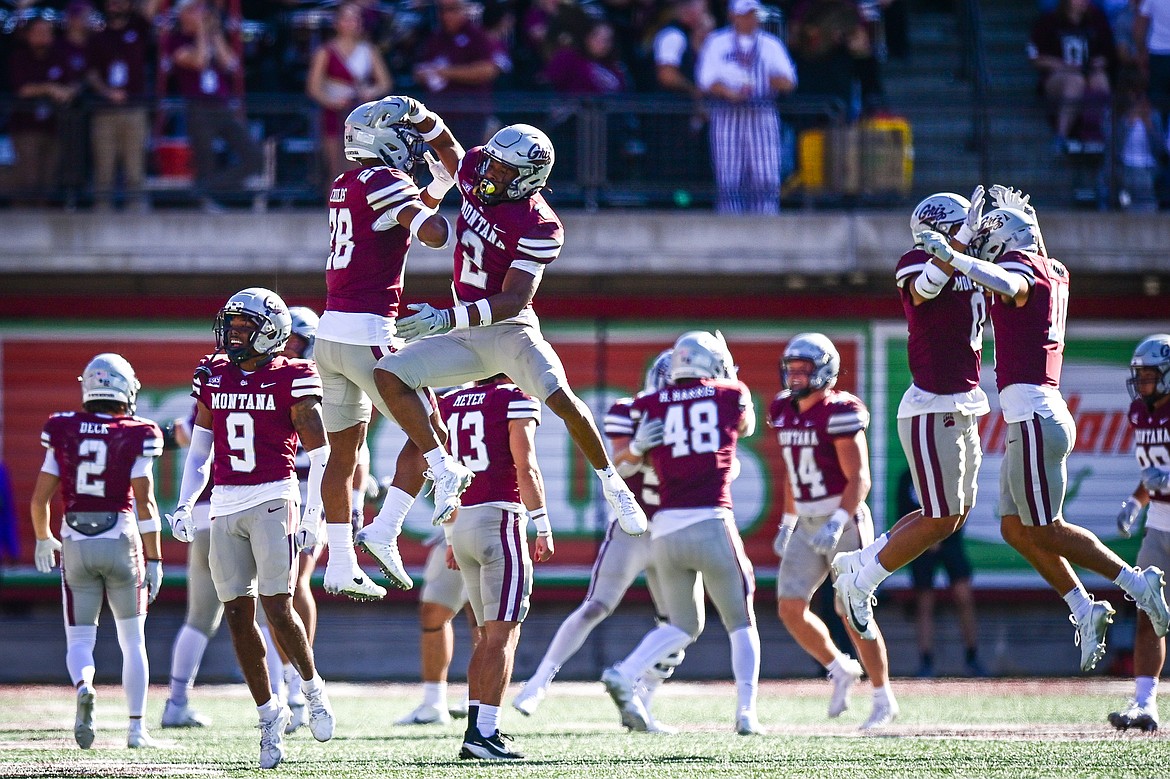 Grizzlies special teamers celebrate after a missed field goal by Western Carolina in the third quarter at Washington-Grizzly Stadium on Saturday, Sept. 21. (Casey Kreider/Daily Inter Lake)