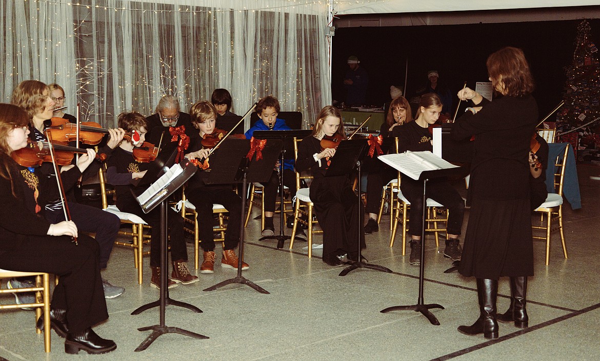 Musicians from the Music Conservatory of Sandpoint perform at the 2023 Festival of Trees.