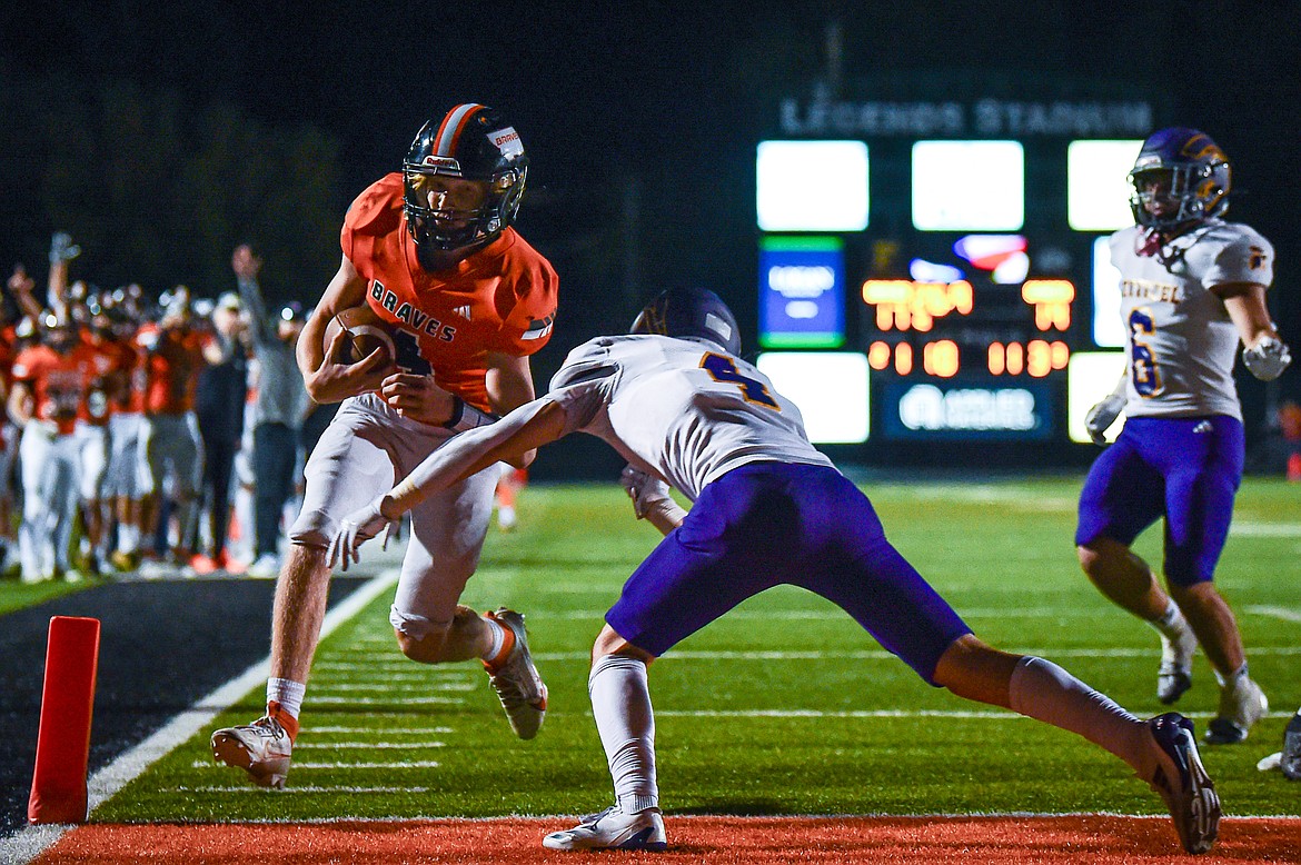 Flathead quarterback Brett Pesola (4) runs for a touchdown in the third quarter against Missoula Sentinel at Legends Stadium on Friday, Sept. 20. (Casey Kreider/Daily Inter Lake)