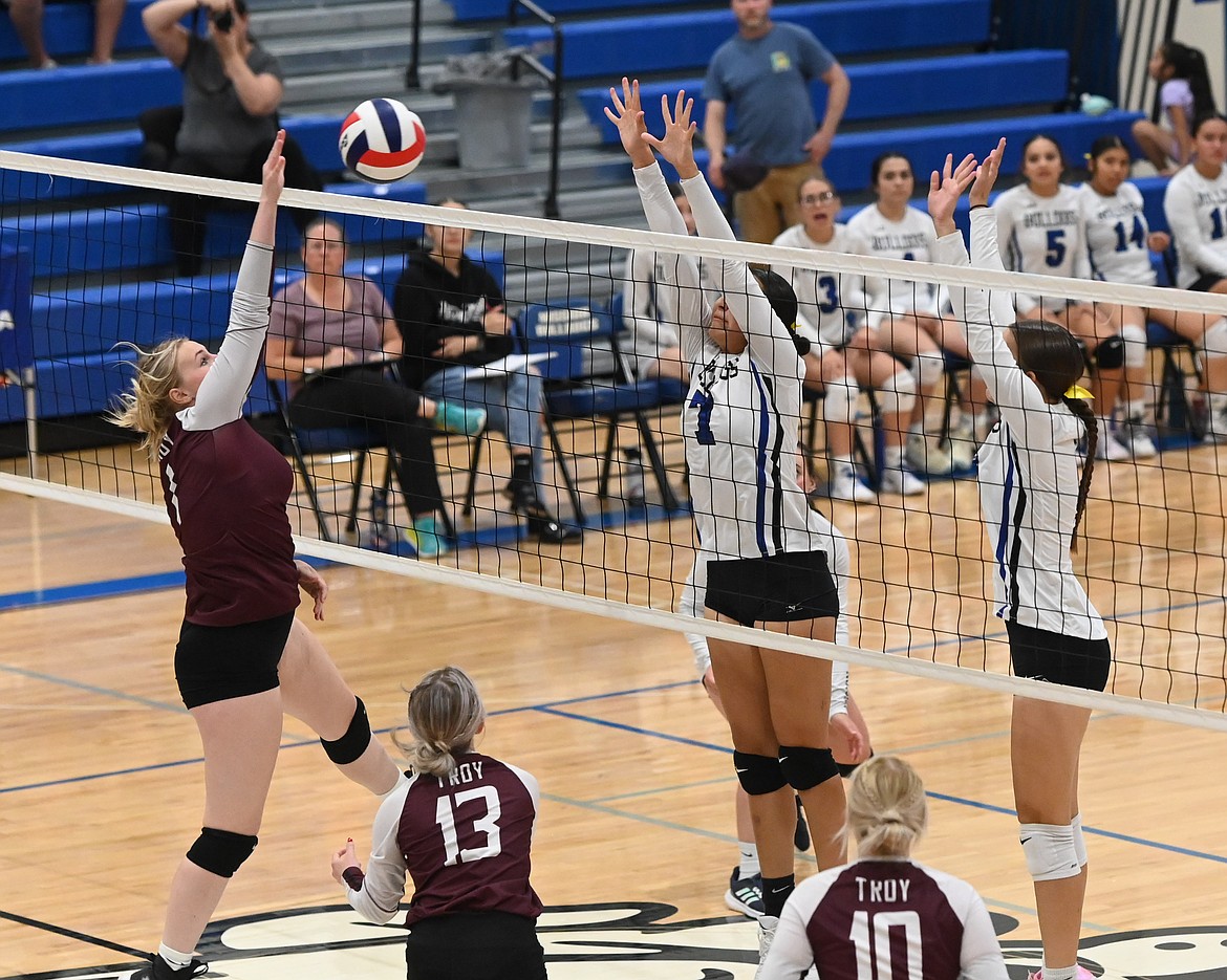 Mission's Cora Matt and Maia Christoper at the net against Troy. (Christa Umphrey photo)