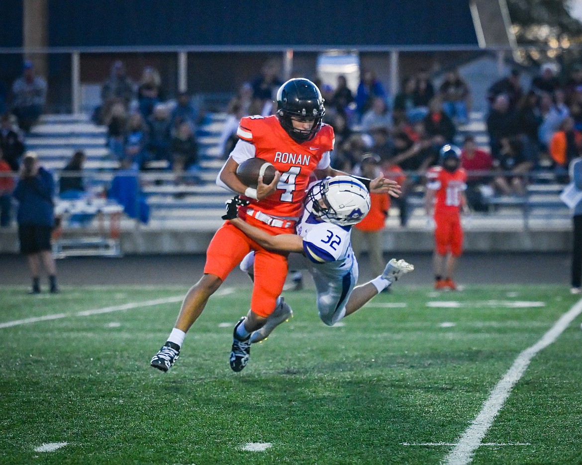 Ronan's Kolby Finley carries the ball against Polson. (Christa Umphrey photo)