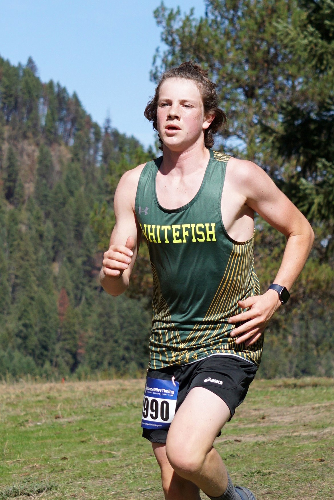 Freshman Luca Gignoux recorded a personal best of 19:51 at Thompson Falls on Saturday. (Matt Weller photo)