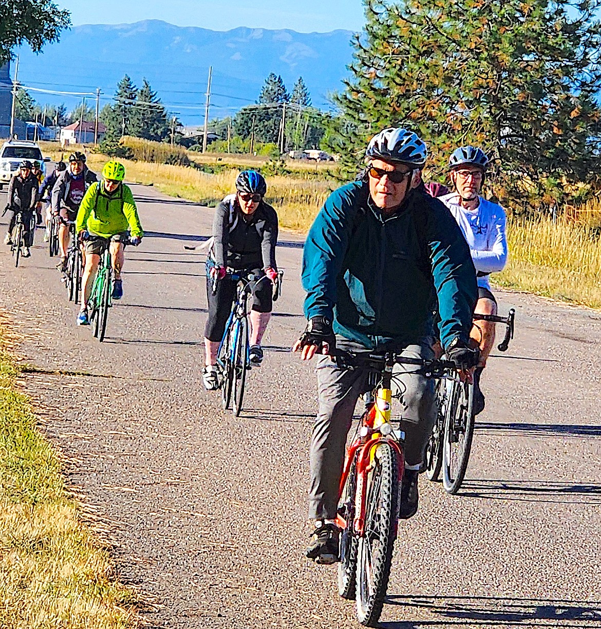 A group of Pedal to Plate bikers led by Rodney Boughey from Dallas, Texas, head down the road. Boughey was riding with his daughters and son-in-law.
(Berl Tiskus/Leader)