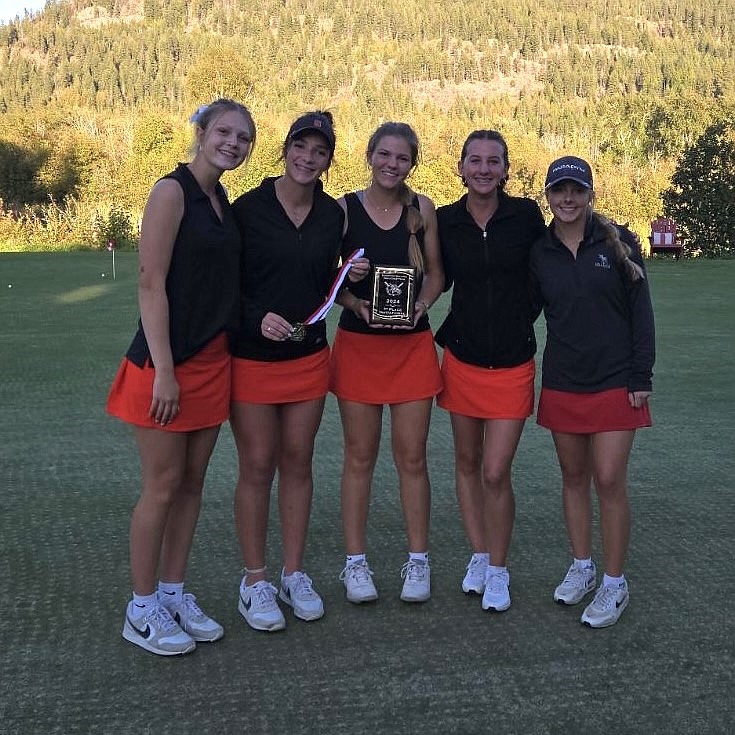 From left, Demi Driggs, Alexa Tuinstra, Claire Loutzenhiser, Raegan Samuels, and Taylor Mire of the Sandpoint High girls' golf team are all smiles after winning the Bulldog Invitational.