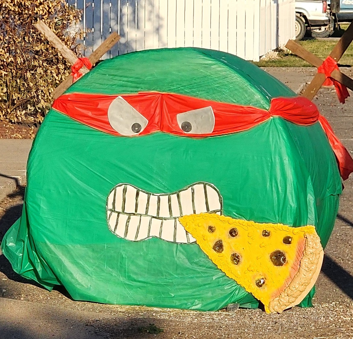 The theme for this year's Ronan Trail of Bales was the 1990s, and  Harvest Foods represented it well with Raphael,one of the Teenage Mutant Ninja Turtles, replete with a piece of pizza and a devilish grin. (Berl Tiskus/Leader)