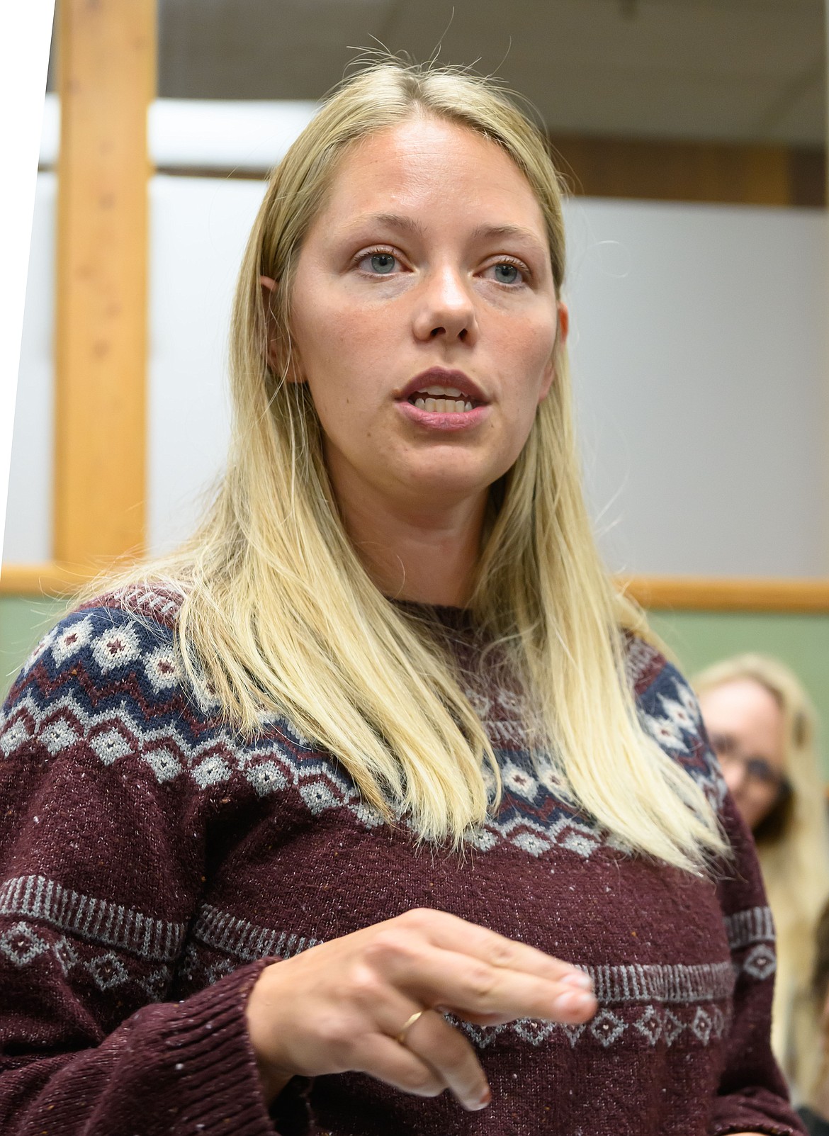 Cabinet Mountain staff member Taylor Salmi speaks to the Plains School Board about the organization that provides services to schools. (Tracy Scott/Valley Press)