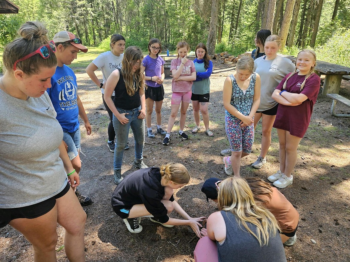 Learning how to build a camp fire was part of the experience for members of the Kootenai Outdoor Adventure Program this summer. (Photo courtesy Bill Moe)