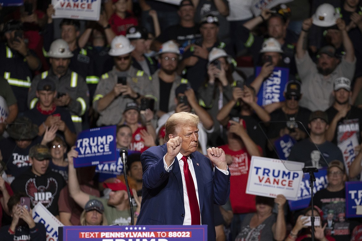 Republican presidential nominee former President Donald Trump dances after finishing his remarks at a campaign rally at Ed Fry Arena in Indiana, Pa., Monday, Sept. 23, 2024. (AP Photo/Rebecca Droke)