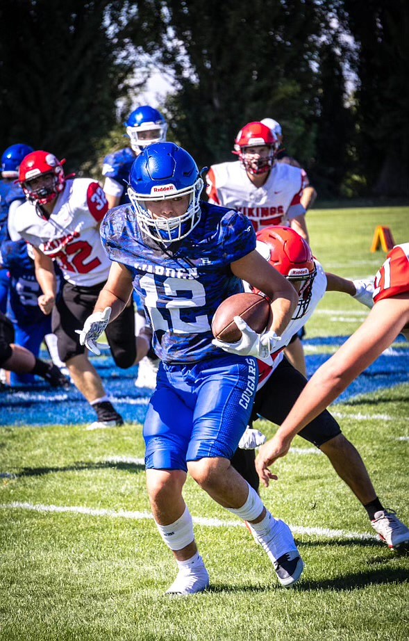 Warden senior Elijah Ruiz (12) carries the ball during a game against Mossyrock on Sept. 14. Head Coach Dallyn McLean noted Ruiz as one of the team’s standouts through the early weeks of the season.