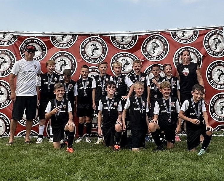 The 2014 Sandpoint Strikers boys' soccer team finished runner-up in the Gold Division of the Pend Oreille Cup. Back from left are coach JP Cardin Jonah Baroni, Easton Chartrey, Finnley Stebbins, Wade McCoy, Anders Budensiek, Kyren Nguyen, Jack Balch and coach Kelly Blach. Front row, from left are Miles Cardin, Dennis (D4) McLeish IV, Elijah Kellogg, Josiah Leadbetter and Summit Albright.