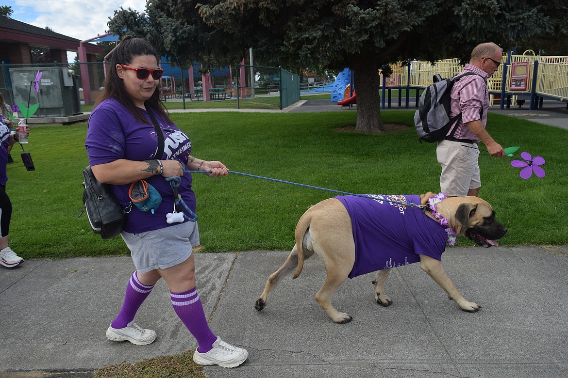 Jessica Reardon and her dog, Stella, Walk to end Alzheimer's on Saturday. Reardon works for the Monroe House, a senior living community.  
“We are just out here to do what we can,” Reardon said.